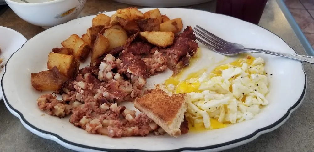 Corn Beef Hash Home Fries Eggs and Toast